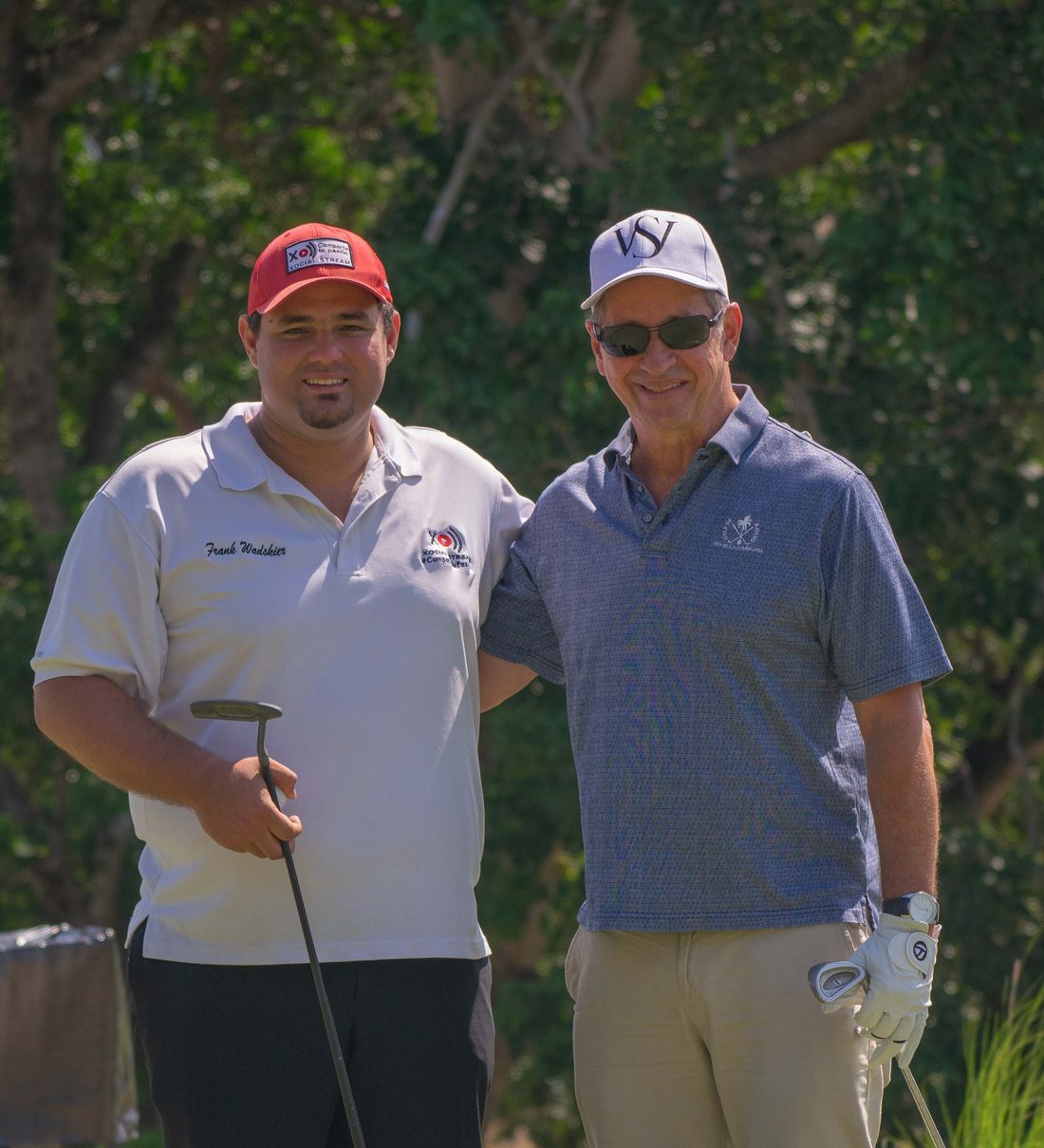 Frank Wadskier with his father on a golf course